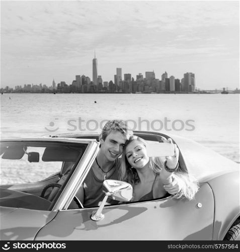 selfie of young teen couple at convertible car in New York Manhattan skyline photo mount