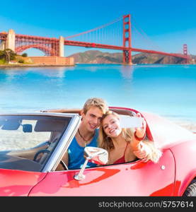 selfie of young teen couple at convertible car in San Francisco Golden Gate Bridge photo mount