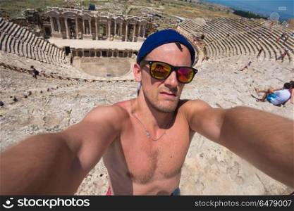Selfie photo in amphitheatre. Selfie photo in amphitheatre in the ruins of Hierapolis, in Pamukkale, Turkey.