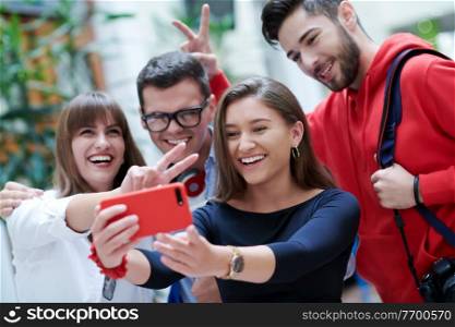 Selfie time!international students with beaming smiles are posing for selfie shot