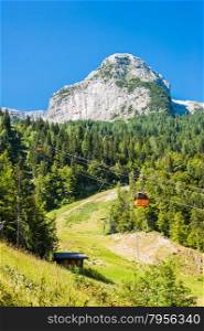 Sella Nevea, Udine, Italy - July 10, 2015: Alpine landscape with cable car
