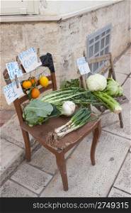 Selling vegetables on a chair in the south of italy