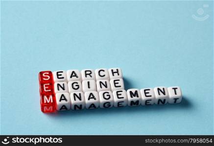 SEM Search Engine Management written on black and white dices