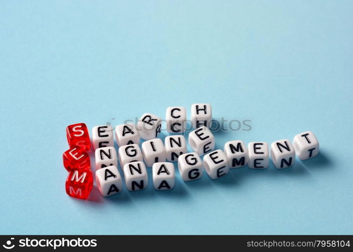 SEM Search Engine Management written on dices on blue