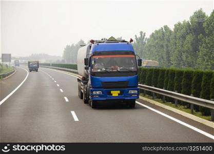 Semi-trucks on a highway, Qufu, Shandong Province, China
