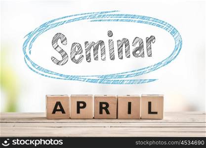 Seminar in april launch sign made of wooden cubes