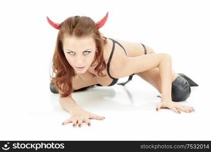 Seminude girl coils in an image of the demon, isolated