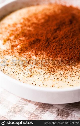 Semolina cream with cocoa powder - sweet breakfast. The semolina cream