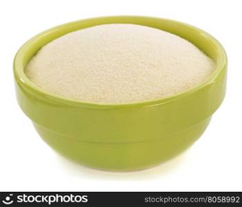 semolina in plate bowl on white background