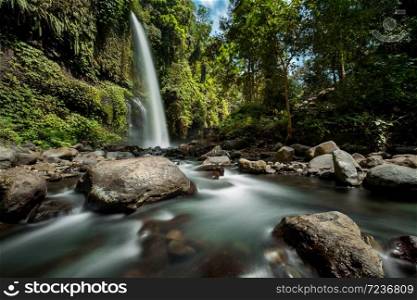 Sendang Gile waterfall is a stunning waterfall on Lombok, Indonesia. Long exposure photography.. Sendang Gile waterfall is a stunning waterfall on Lombok, Indonesia.