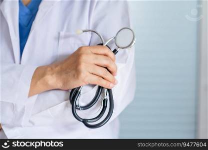 senior asian woman doctor wearing glasses and uniform with stethoscope in hand Healthcare and medical concept.