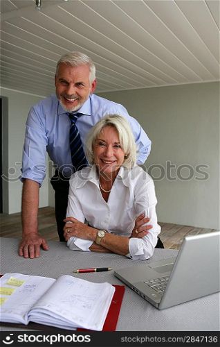 Senior business couple