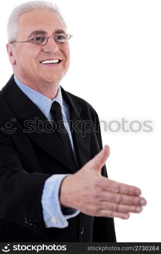 Senior business man holding out his hand for a handshake over white background