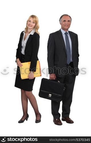 Senior businessman and young assistant