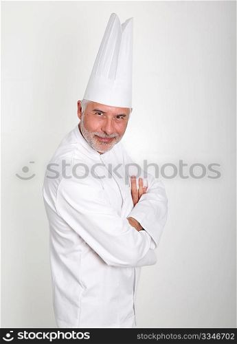 Senior chef with arms crossed