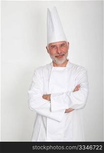 Senior chef with arms crossed