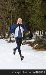 senior-country skiers in winter on snow when jogging