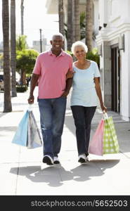 Senior Couple Carrying Shopping Bags