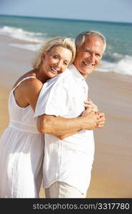 Senior Couple Enjoying Beach Holiday