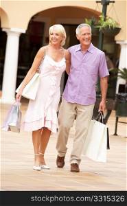 Senior Couple Enjoying Shopping Trip Together