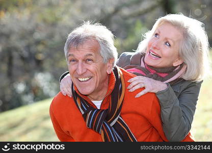 Senior couple having fun in countryside