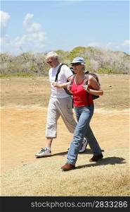 Senior couple hiking in desert