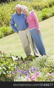 Senior couple in a flower garden