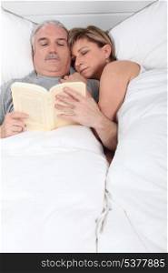 senior couple in bed