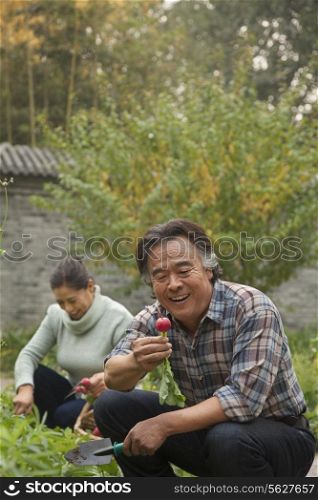 Senior couple in garden