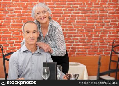 Senior couple in restaurant
