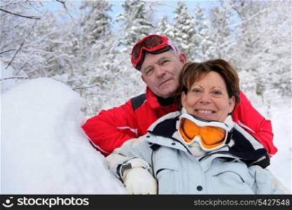 Senior couple in the snow