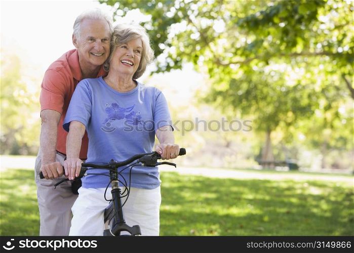 Senior couple on a bicycle