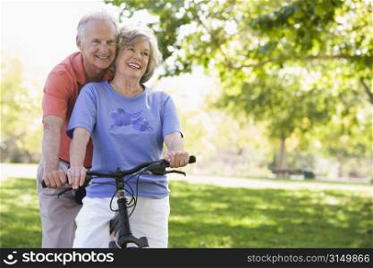 Senior couple on a bicycle
