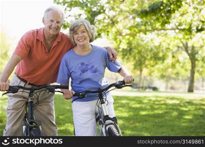 Senior couple on bicycles