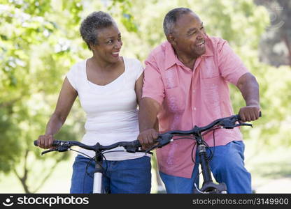 Senior couple on bicycles