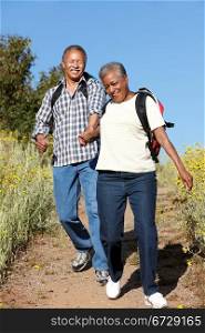 Senior couple on country hike