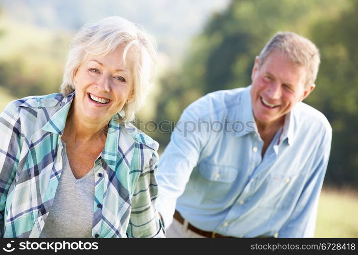 Senior couple on country walk