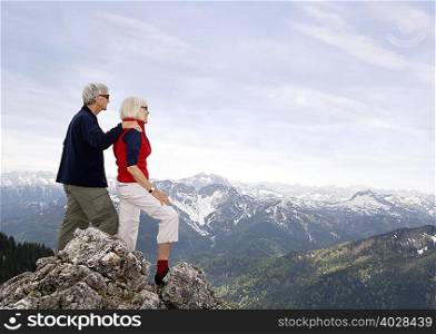 senior couple on mountain summit