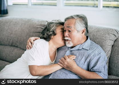 Senior couple Playing together at living room