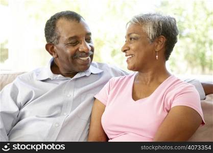 Senior Couple Relaxing At Home Together
