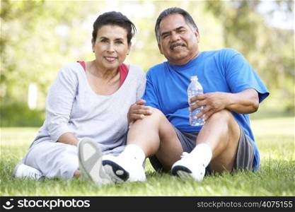 Senior Couple Resting After Exercise
