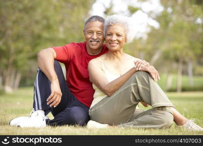 Senior Couple Resting After Exercise