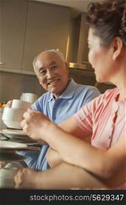 Senior couple sharing tea