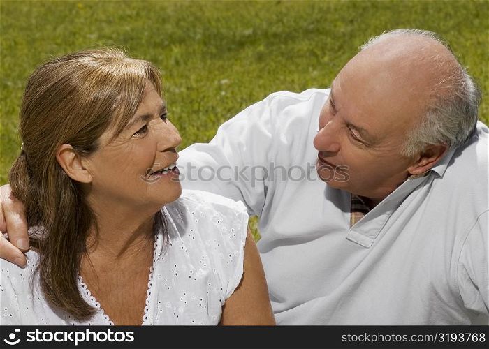 Senior couple sitting in a park