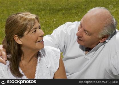 Senior couple sitting in a park