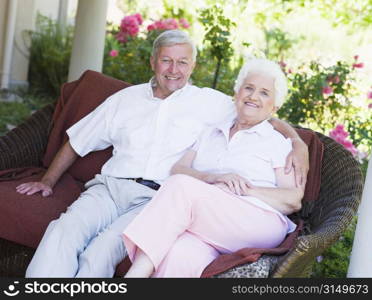 Senior couple sitting outdoors