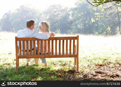 Senior couple sitting outdoors