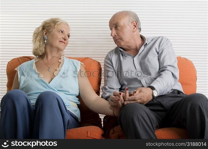 Senior couple sitting together
