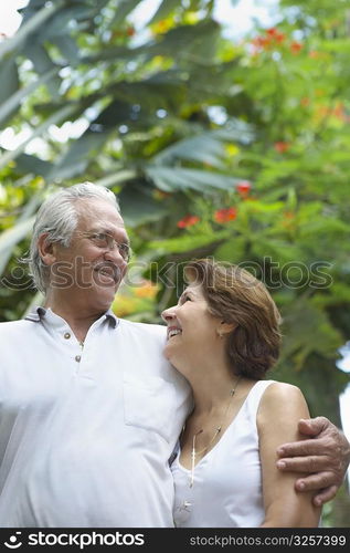 Senior couple standing together and smiling