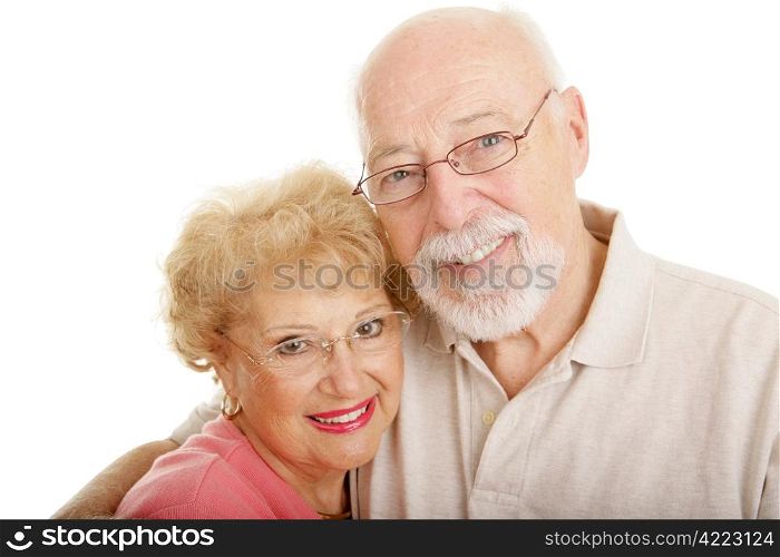 Senior couple wearing glasses. White background.
